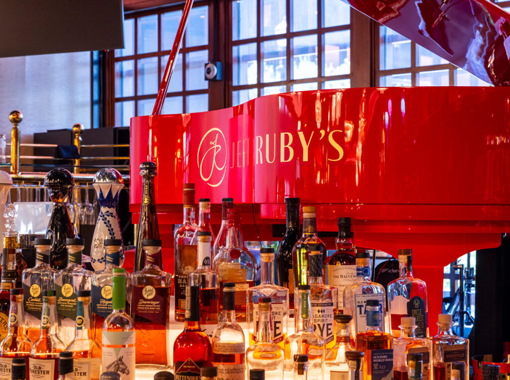 Red piano with JR logos