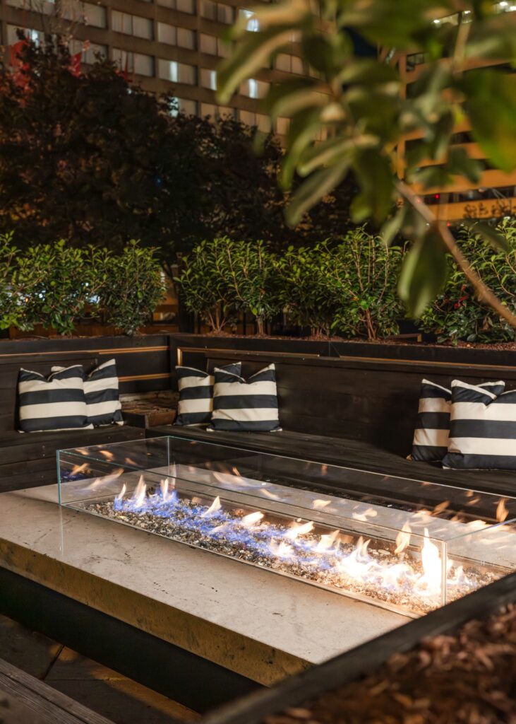 couch with fireplace in the middle